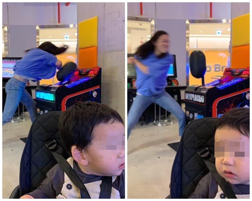 韓星李美度用力揮拳、肘擊遊戲機,兒子一旁冷靜不睬媽媽的反應,讓網友笑翻。(翻攝自李美度IG)